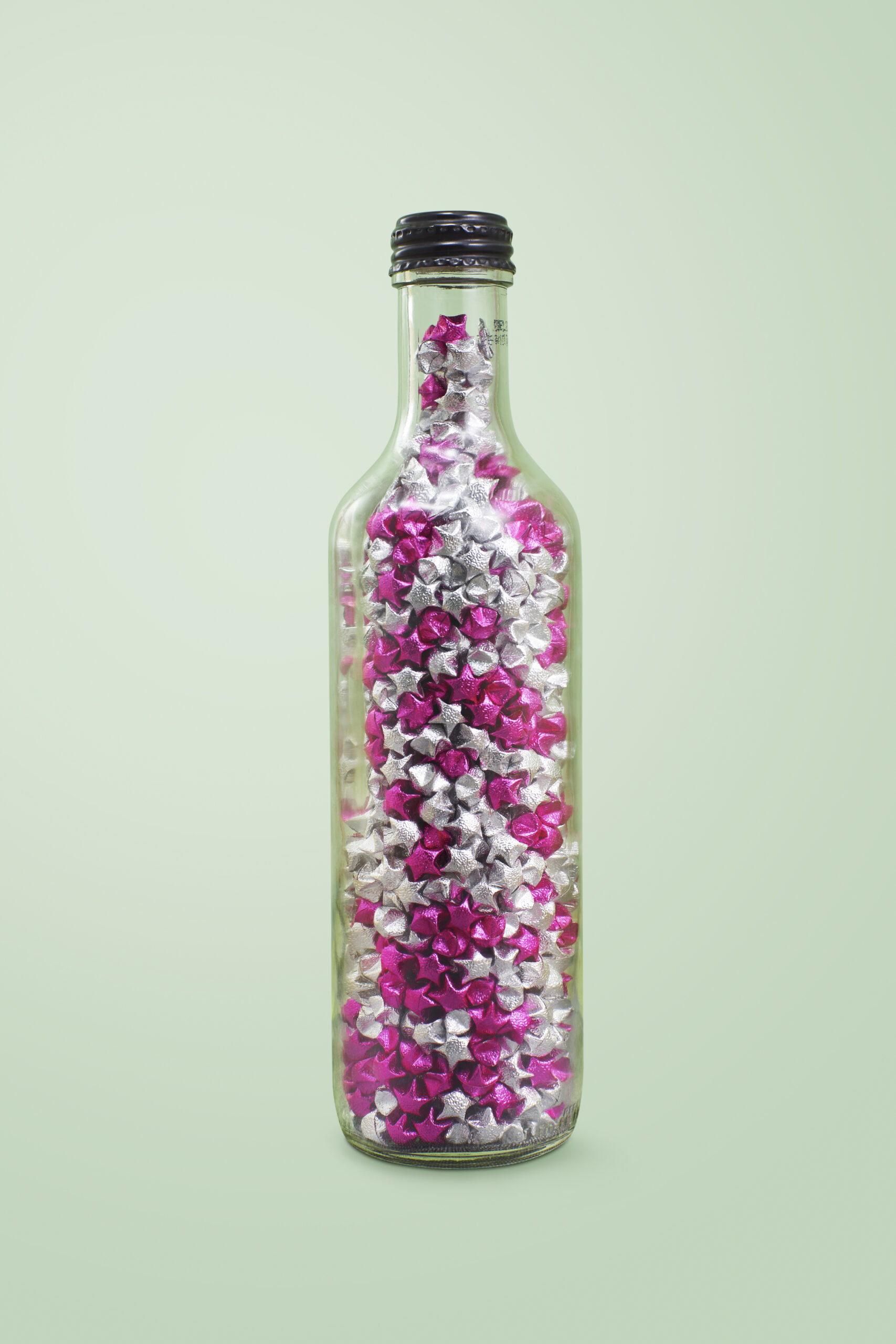 Lucky stars in a glass bottle with clippiing path