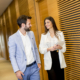 Business couple with tablet in the office