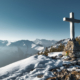 The cross on top of a mountain in the Italian Alps