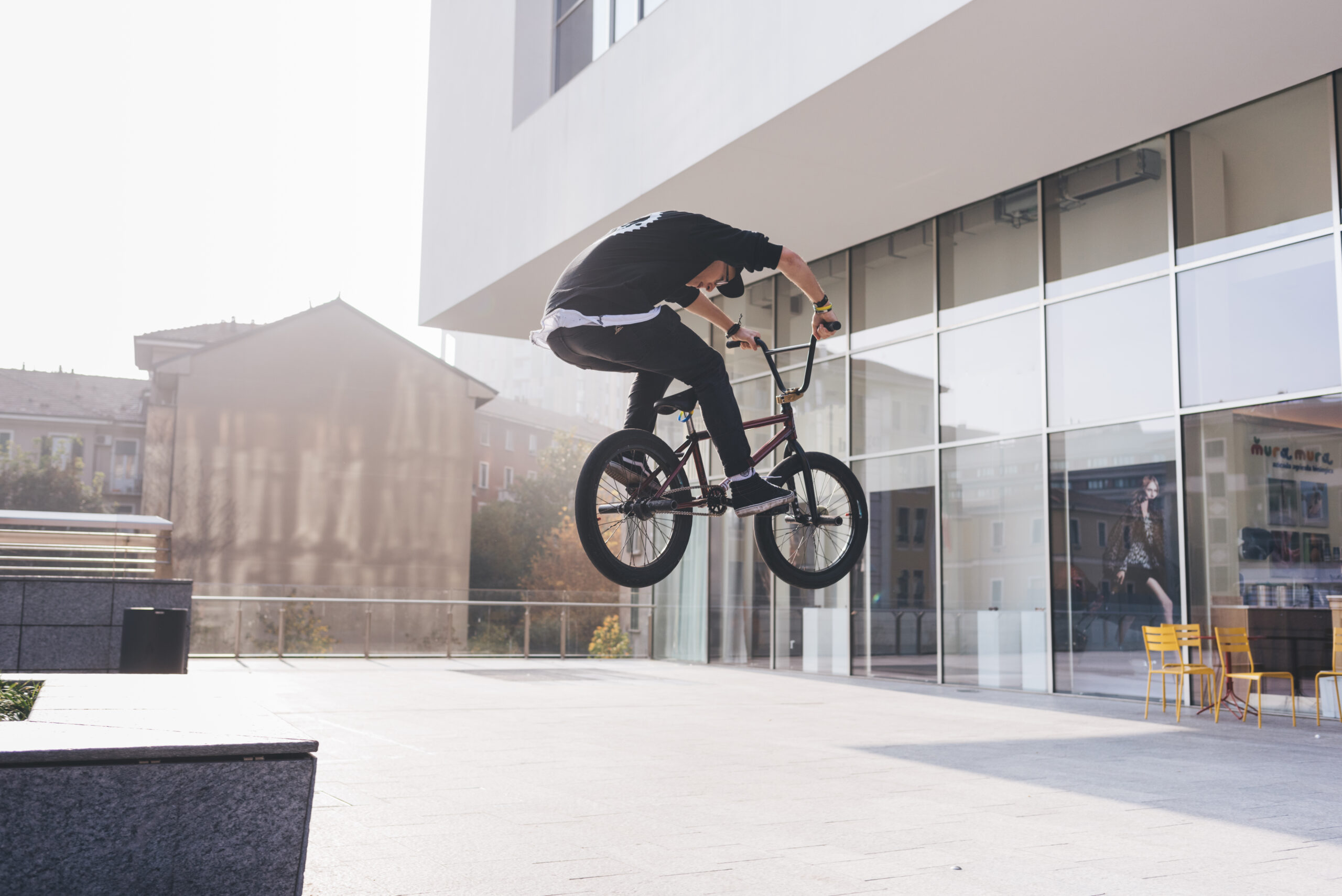 young man using bmx