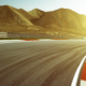 Motion blurred race track .